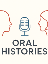 image of 2 characters speaking into a microphone