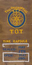 Wooden lid of the box containing the contents of the TOT Time Capsule.