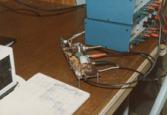 Color photograph of a piece of equipment on a desk.